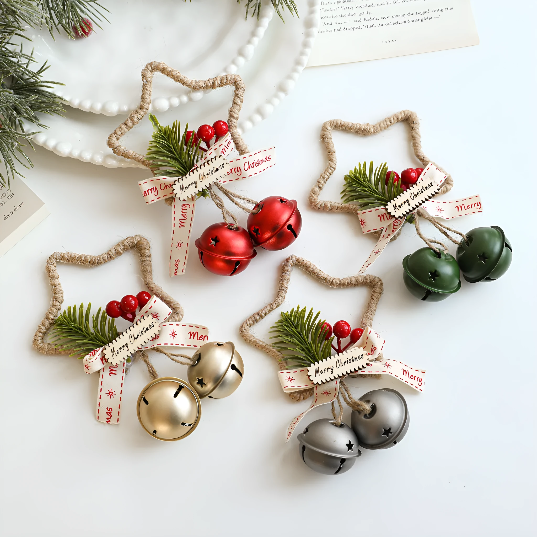 Iron Christmas bell ornament in gold on white background