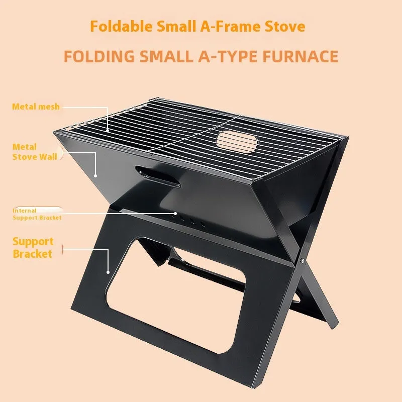 Black folding portable barbecue grill 44x29x37cm with carry handle outdoors