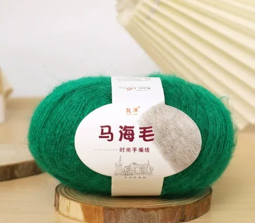 DIY mohair scarf knitting kit showing a ball of wool with 34 colour options including white, grey, pink, and blue.