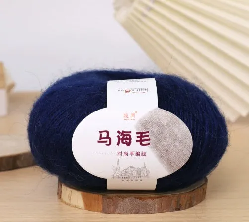 DIY mohair scarf knitting kit showing a ball of wool with 34 colour options including white, grey, pink, and blue.