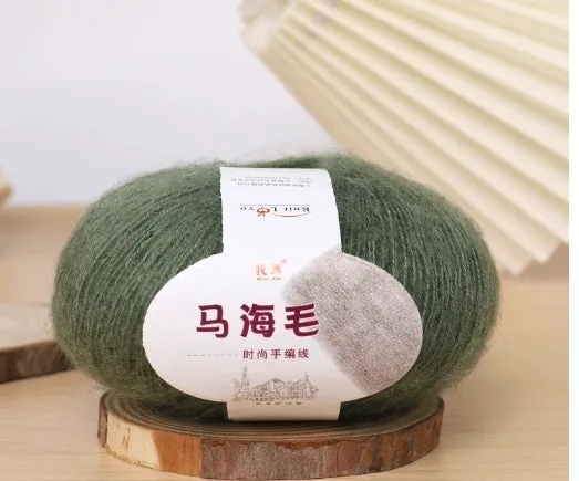 DIY mohair scarf knitting kit showing a ball of wool with 34 colour options including white, grey, pink, and blue.
