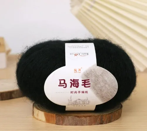 DIY mohair scarf knitting kit showing a ball of wool with 34 colour options including white, grey, pink, and blue.