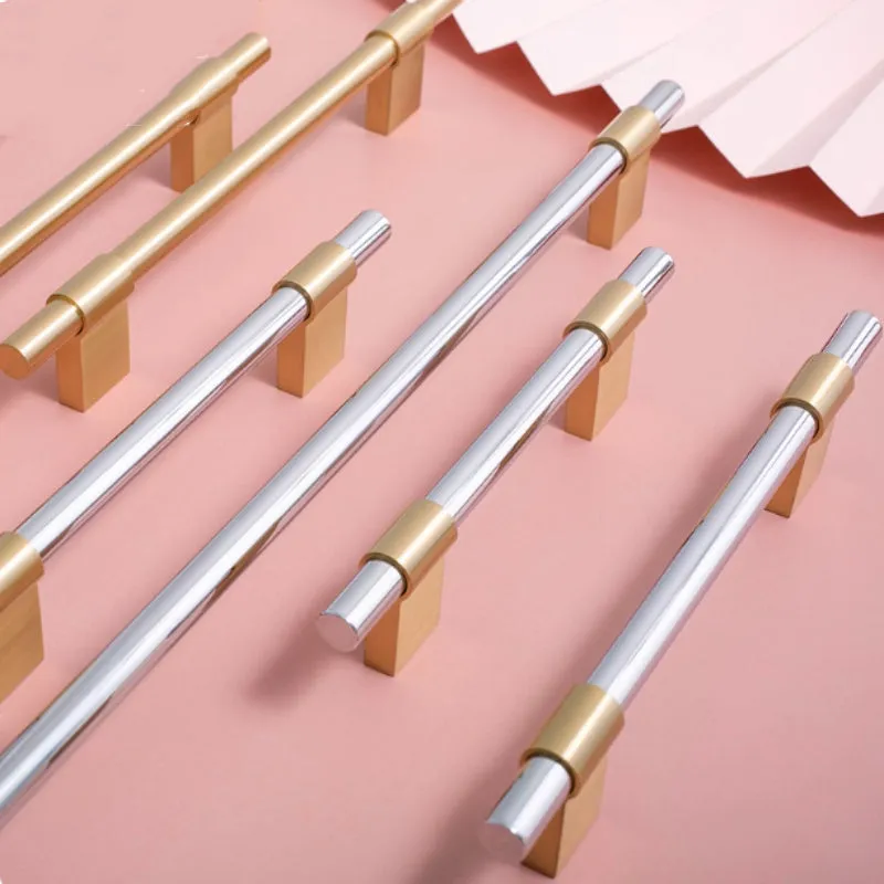 Minimalist brass drawer handle in silver finish with 128mm hole spacing for cabinet doors