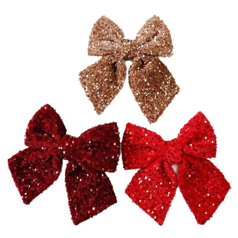 25cm red paillette Christmas sequin bow pendant on white background