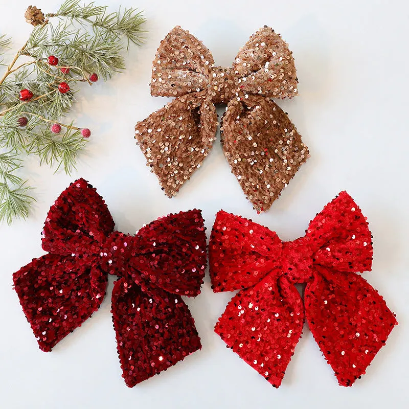 25cm red paillette Christmas sequin bow pendant on white background