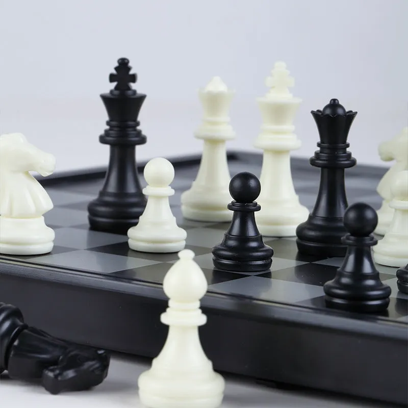 Portable folding ABS chessboard 32cm for students and children, open on a flat surface