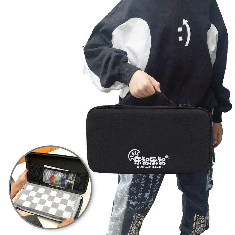 Portable folding ABS chessboard 32cm for students and children, open on a flat surface