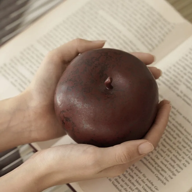 Retro Chinese style ceramic apple ornament for desktop decoration in large and small sizes.