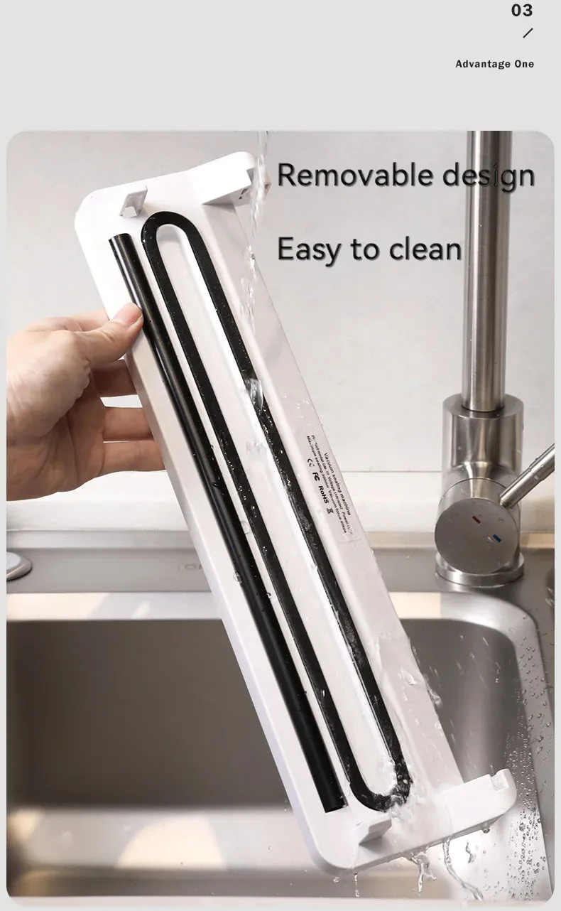 Compact black automatic vacuum sealer machine for household food preservation and item protection