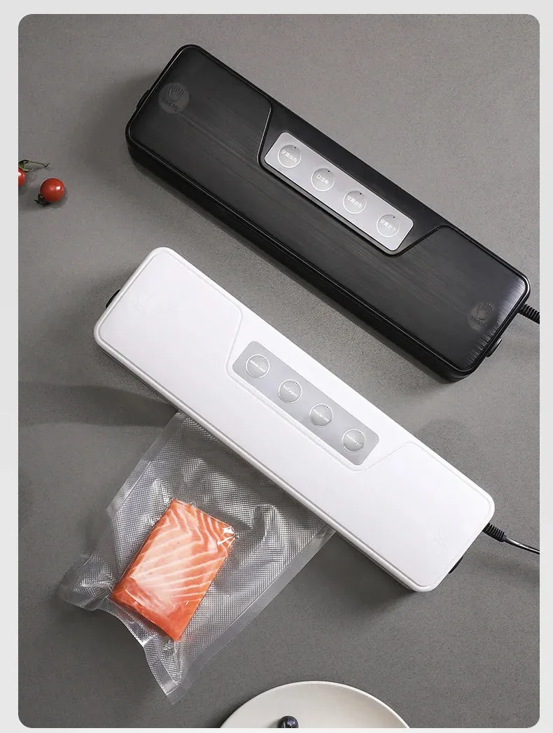 White automatic vacuum sealer machine on a kitchen counter