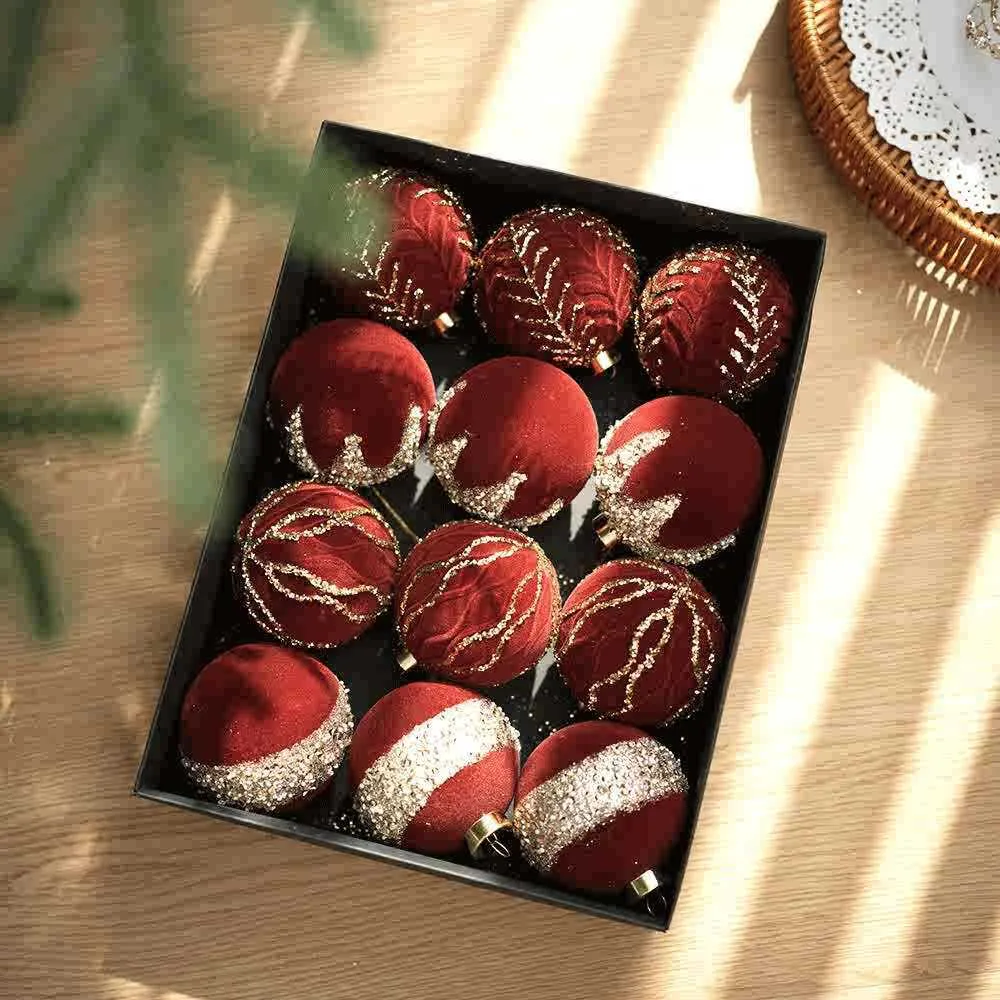Twelve flocked Christmas ball pendants in wine red, milky white, and Maillard colour in a paper box