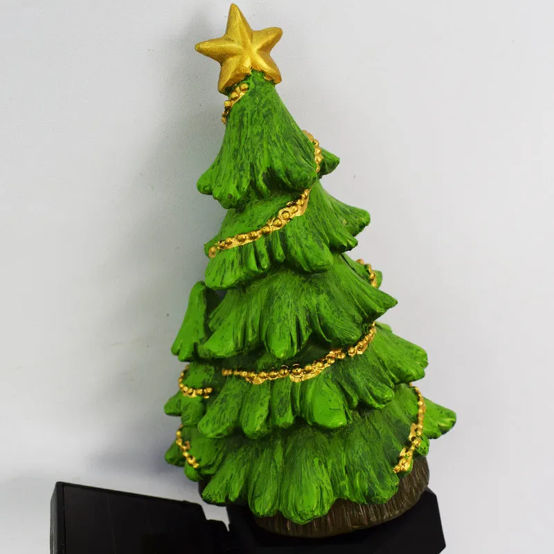Solar Christmas tree ground plug light with warm white LED on a lawn, IP65 waterproof resin construction