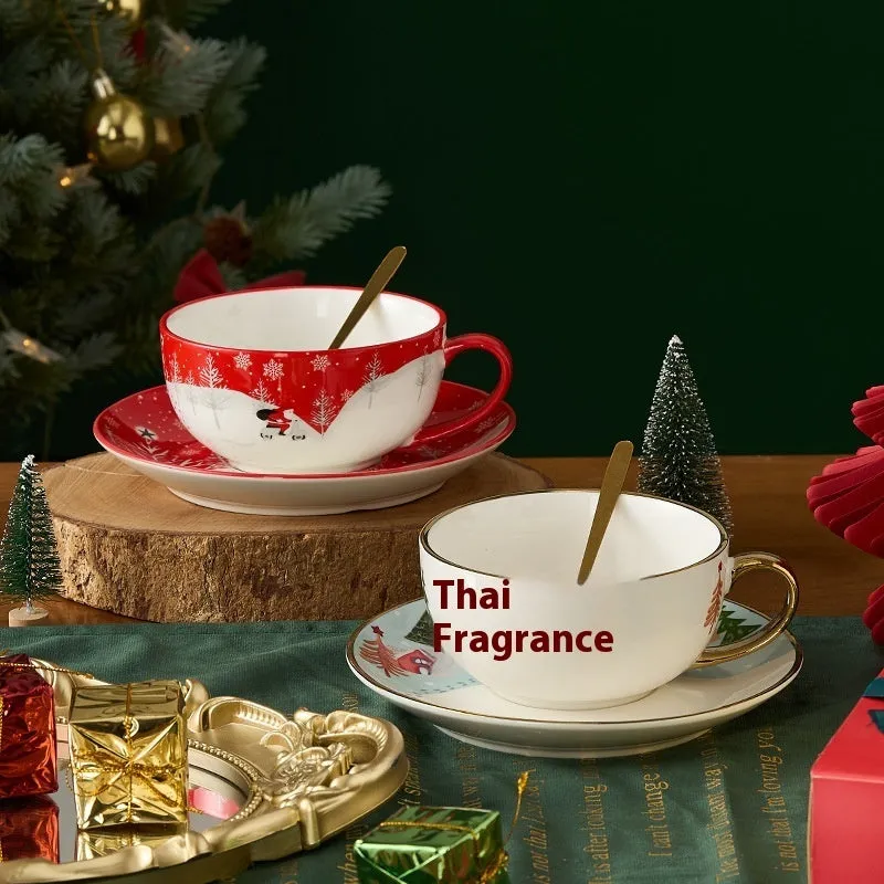 Ceramic tea set with gold-plated teapot and matching cup on dish, snowflake pattern, gift box