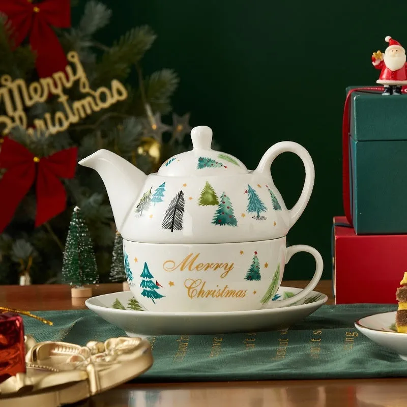 Ceramic tea set with gold-plated teapot and matching cup on dish, snowflake pattern, gift box