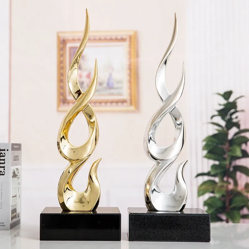 Resin festival high-rise decoration craft in bright gold colour with modern simple design
