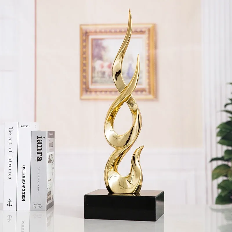Resin festival high-rise decoration craft in bright gold colour with modern simple design