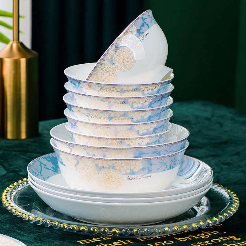 16 piece new bone china dinner set with bowls plates spoons and chopsticks on a table