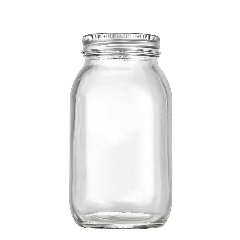 Set of six transparent 32oz glass bottles with airtight lids on a kitchen shelf