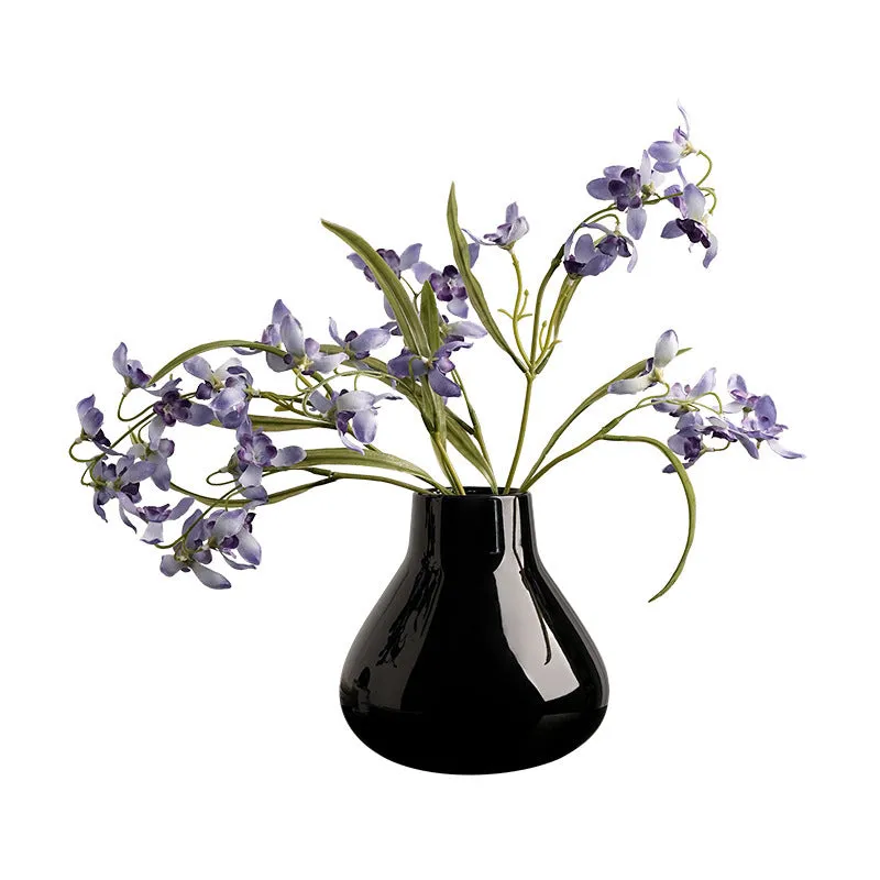 Ceramic round belly vase with black or white coloured glaze finish and modern simplicity design