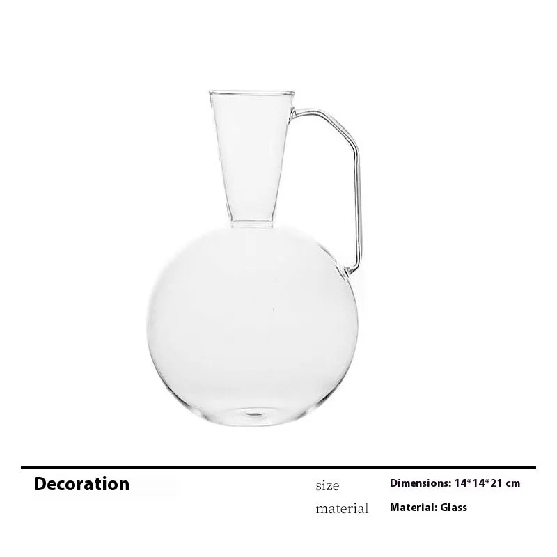 Modern wine accessories set including glassware, ice bucket, and stainless steel ornaments on a table