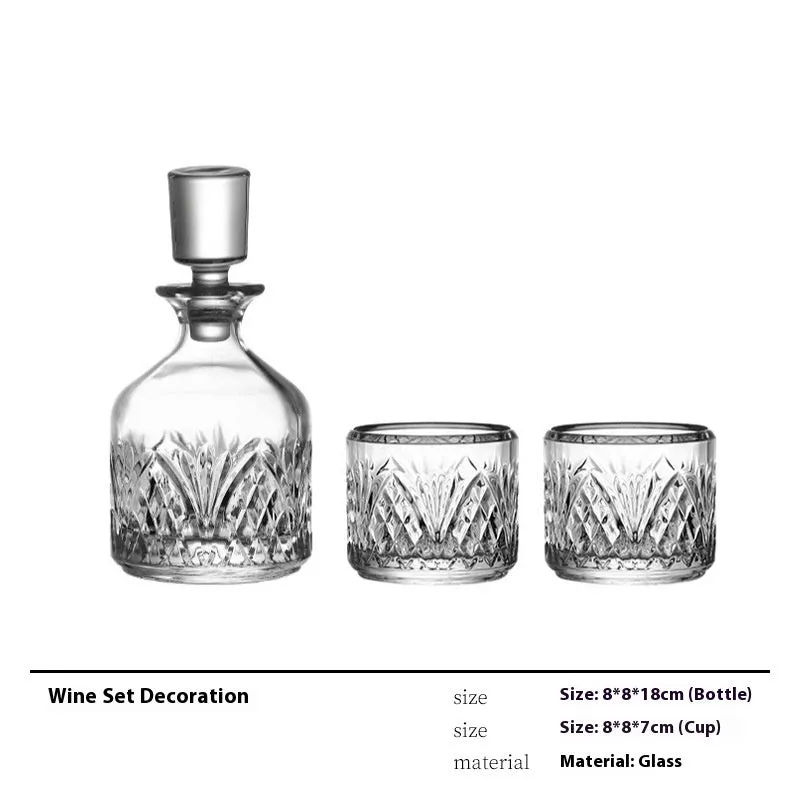 Modern wine accessories set including glassware, ice bucket, and stainless steel ornaments on a table