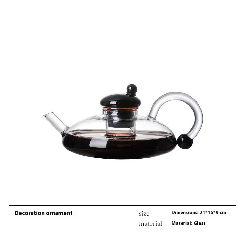 Modern wine accessories set including glassware, ice bucket, and stainless steel ornaments on a table
