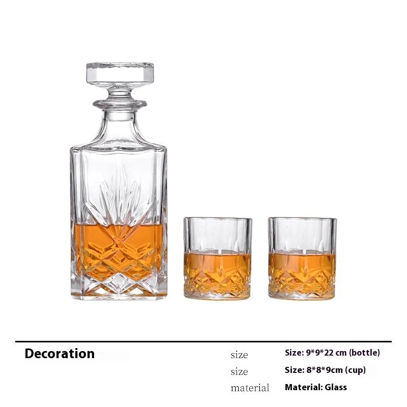Modern wine accessories set including glassware, ice bucket, and stainless steel ornaments on a table
