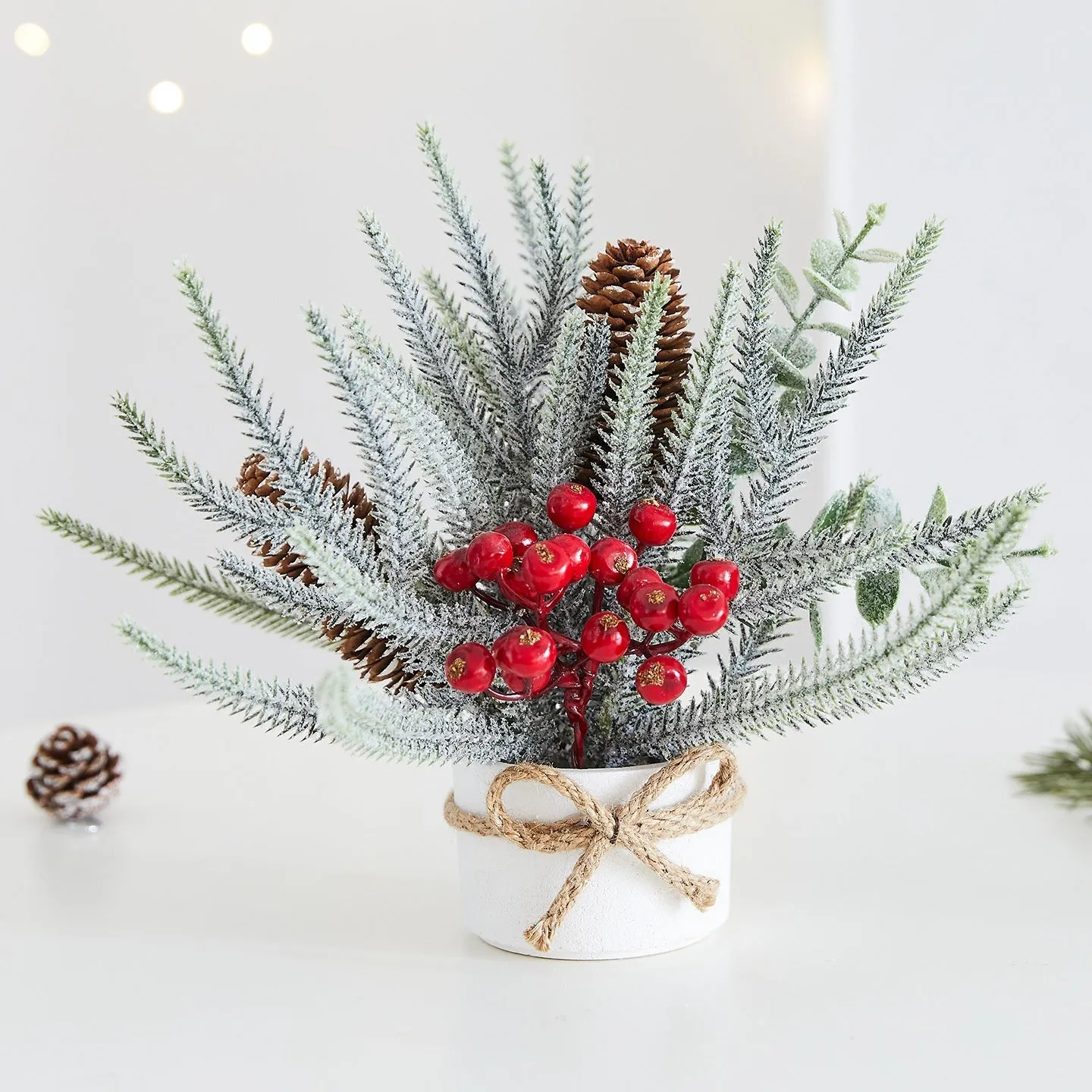 Desktop mini Christmas tree ornament with four colour options in European, American, and Nordic styles made from plastic, PVC, PET, and cloth.