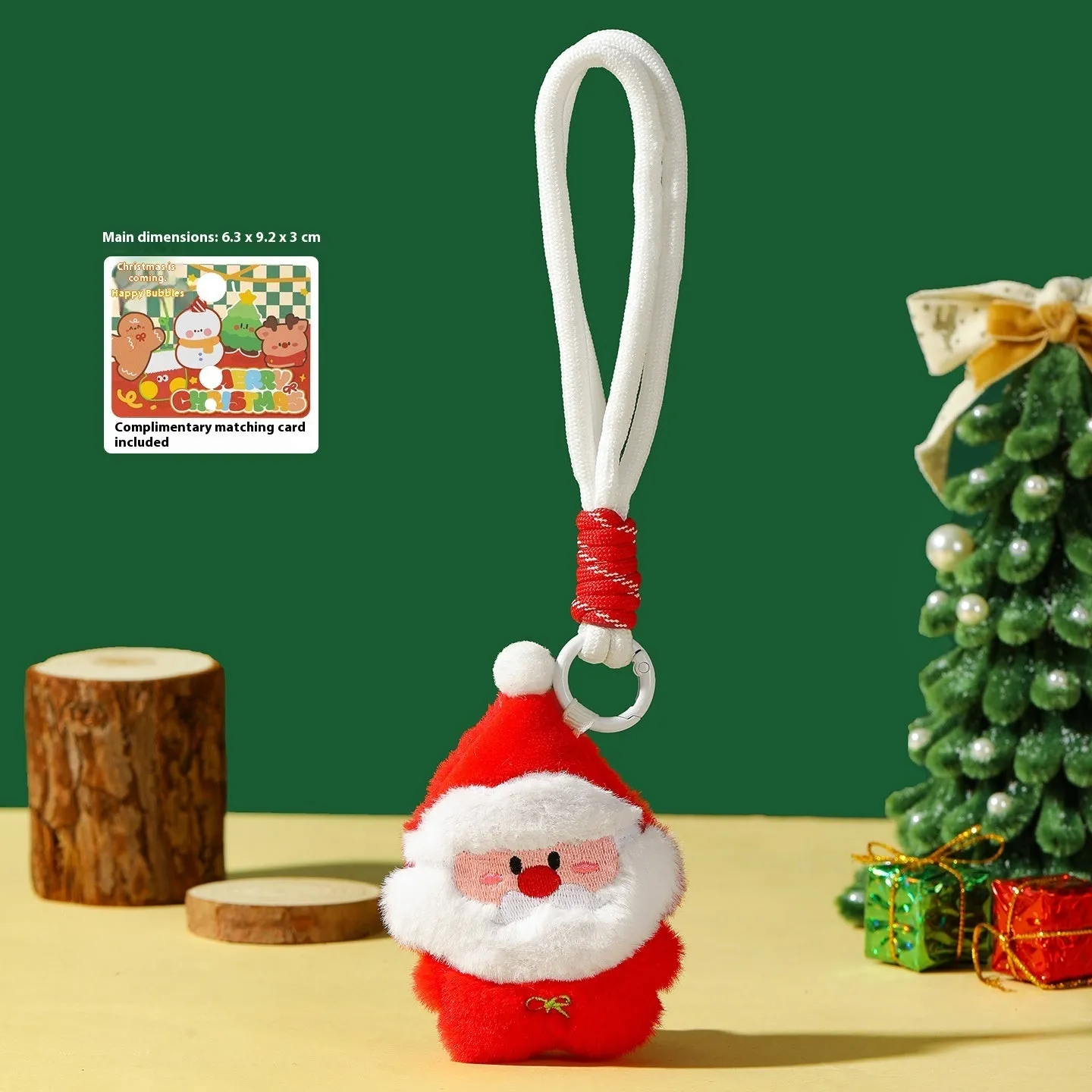 Set of eight Christmas plush pendant keychains in cartoon designs including Santa Claus, snowman, gingerbread man, Christmas tree, and more