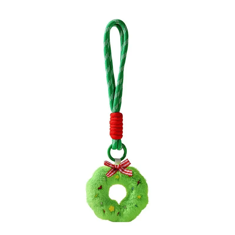 Set of eight Christmas plush pendant keychains in cartoon designs including Santa Claus, snowman, gingerbread man, Christmas tree, and more