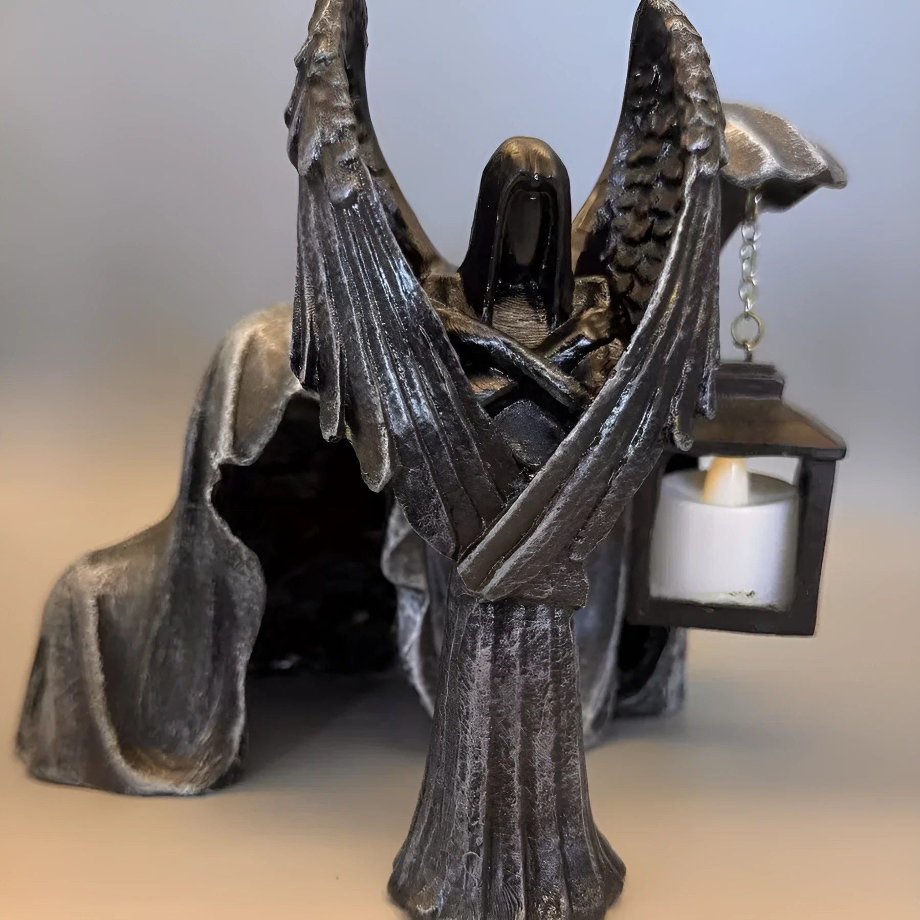 Dark Angel Statue resin ornament measuring 6.5 by 5 by 17 centimetres.
