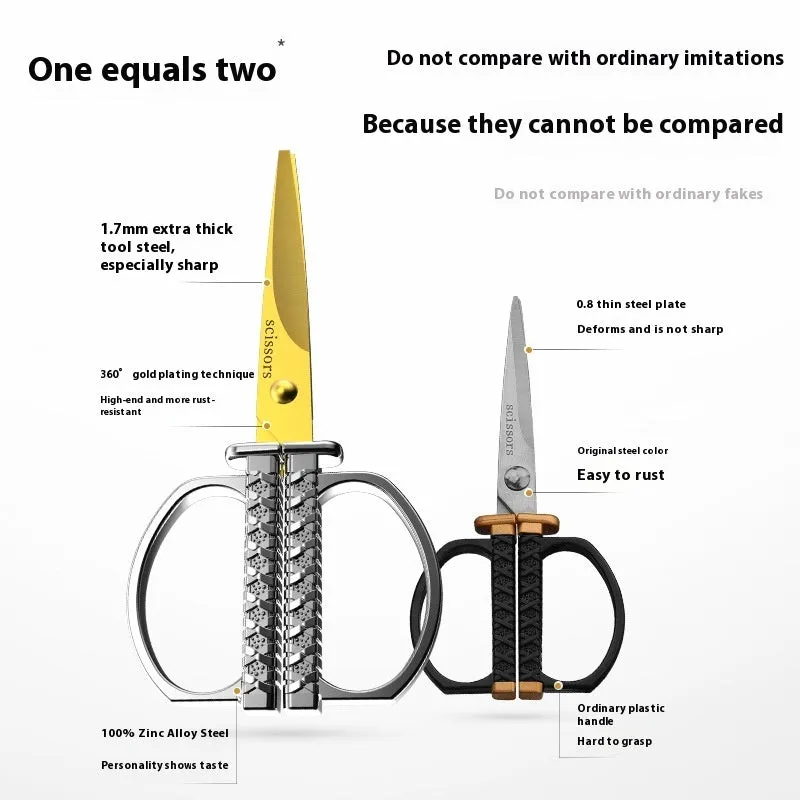 Gold, black, and silver art paper cutting scissors with straight head blades on a white background