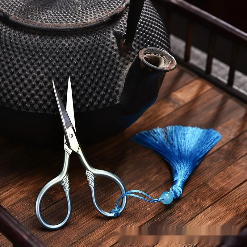 Mini stainless steel tea bag scissors with classical creative design in silver colour