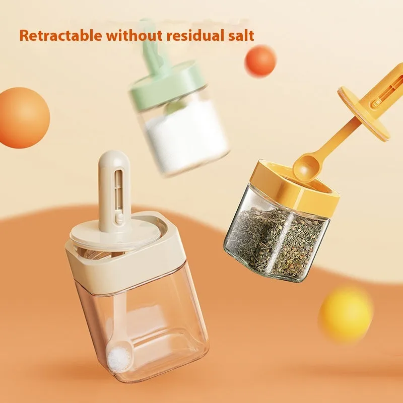 Yellow retractable glass seasoning jar with lid in Nordic style on kitchen counter
