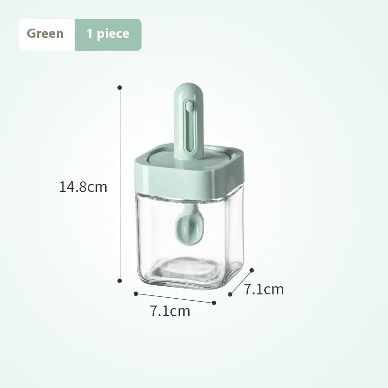 Yellow retractable glass seasoning jar with lid in Nordic style on kitchen counter