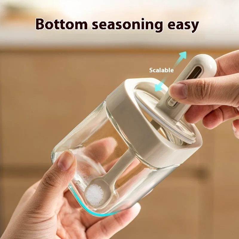 Yellow retractable glass seasoning jar with lid in Nordic style on kitchen counter