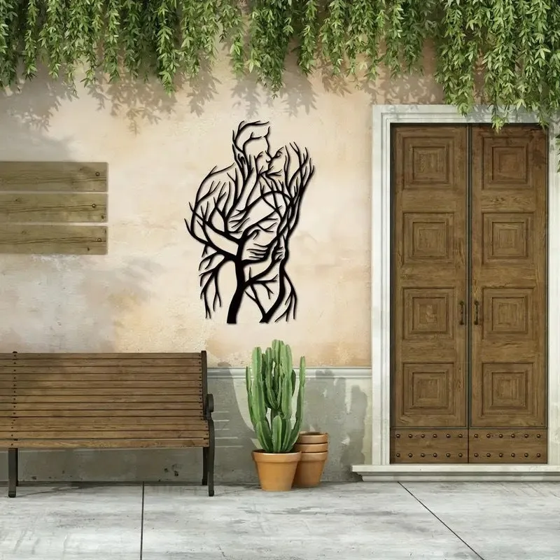 Black iron wall decoration with couple hug silhouette in modern simplicity style