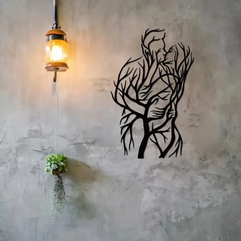 Black iron wall decoration with couple hug silhouette in modern simplicity style