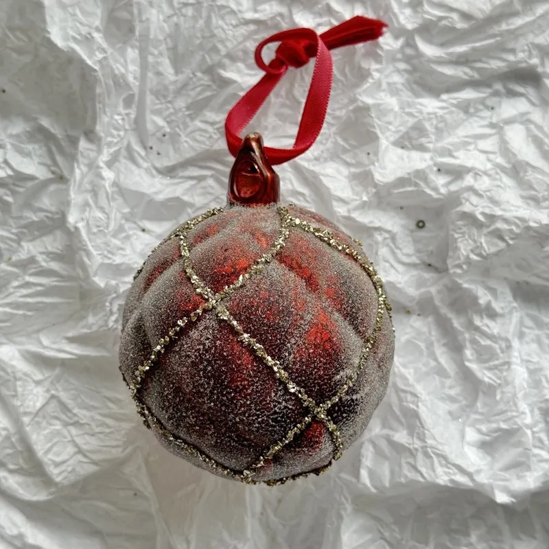 Handmade glass Christmas bauble 8cm diameter in green on branch