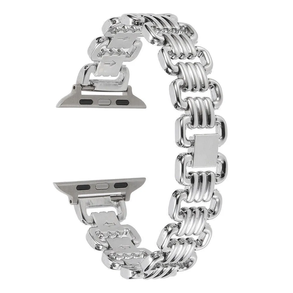 Silver alloy metal replacement bracelet strap for Apple Watch on a table.