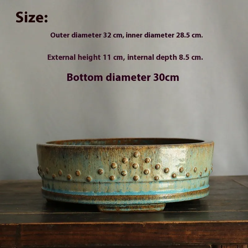 Handmade purple sand ceramic round drum flower pot with high-temperature firewood glaze in nail compound colour for indoor plants