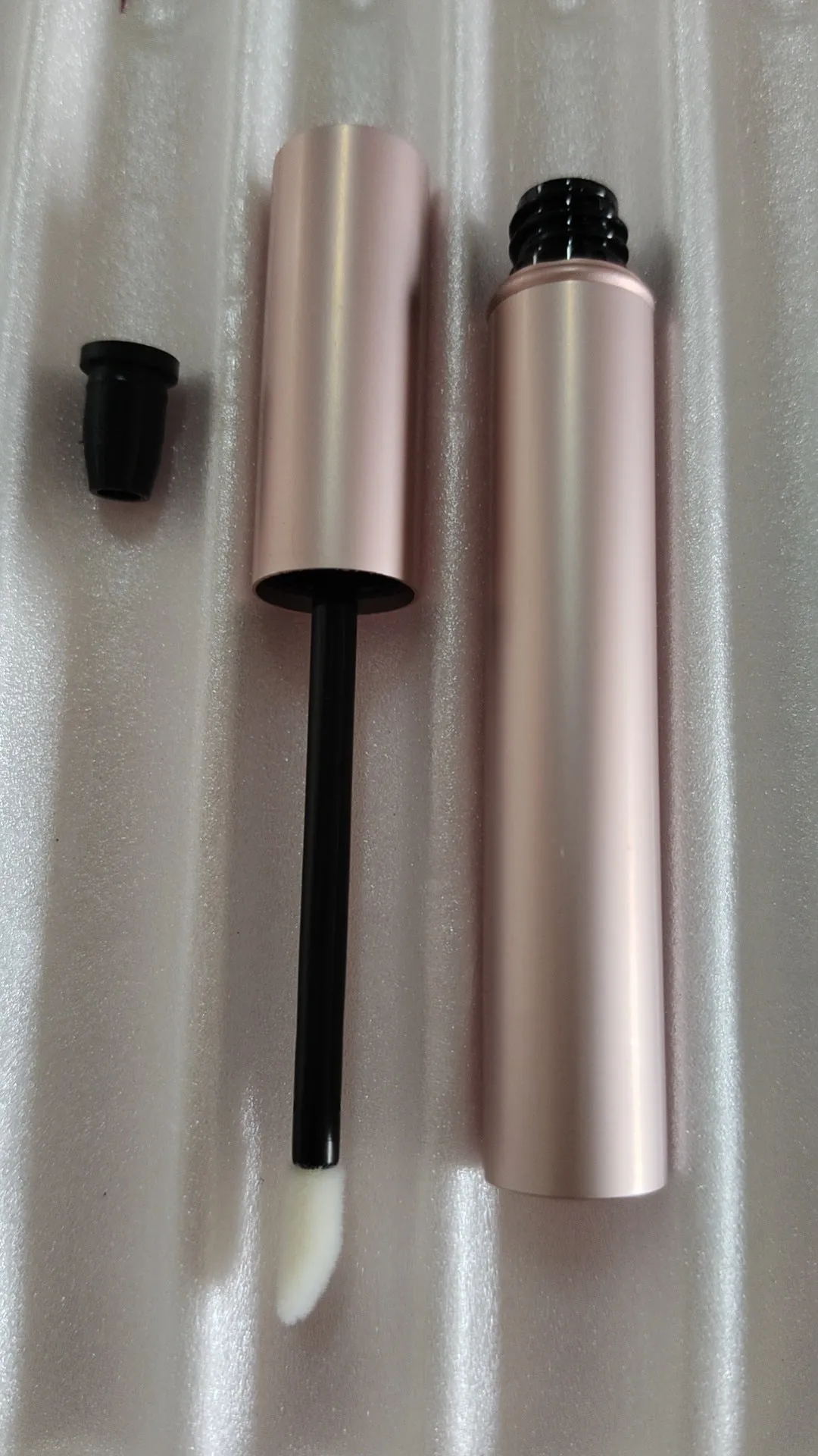 Aluminum tube 4ml cosmetic bottle with spray rose gold paint finish and black inner plug