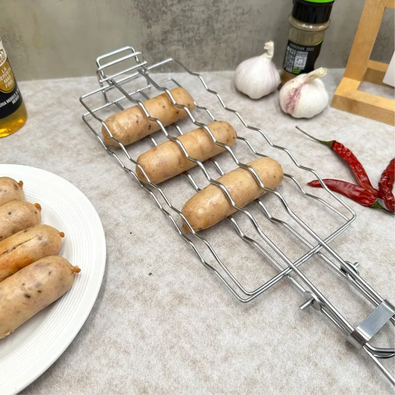 Stainless steel removable folding outdoor barbecue net, square modern style, with black handle, placed over charcoal fire.