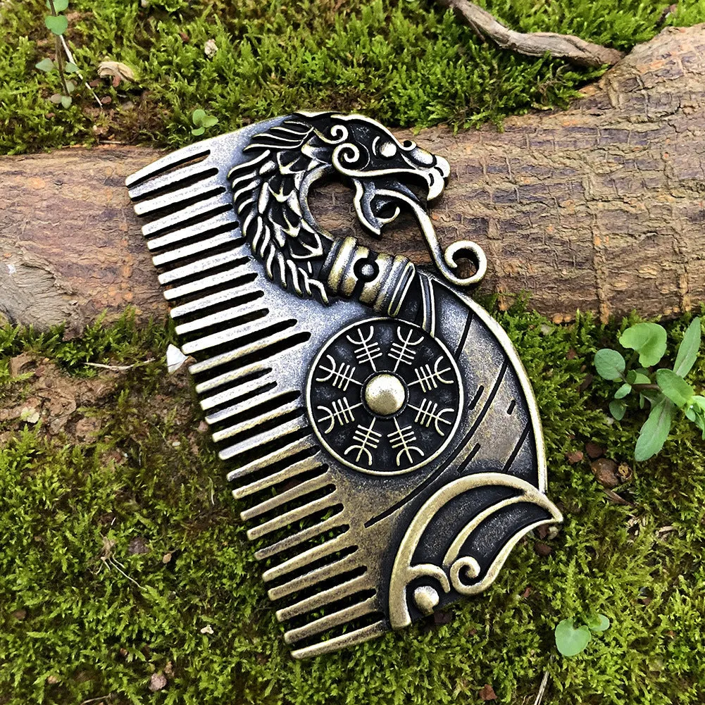 Bronze double-sided Viking rune comb with dragon motif on neutral background