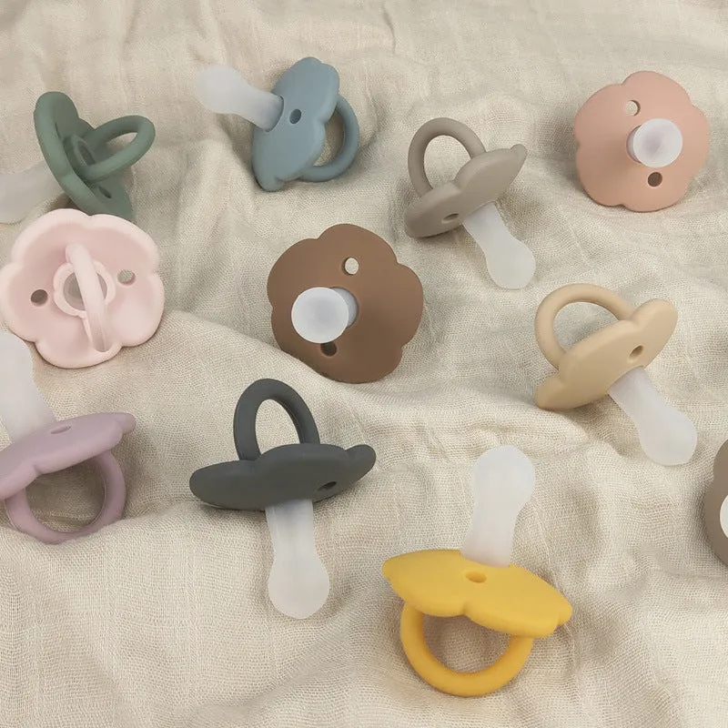 Baby pacifier in edible silicone with lace nipple in apricot colour for 0-6 months