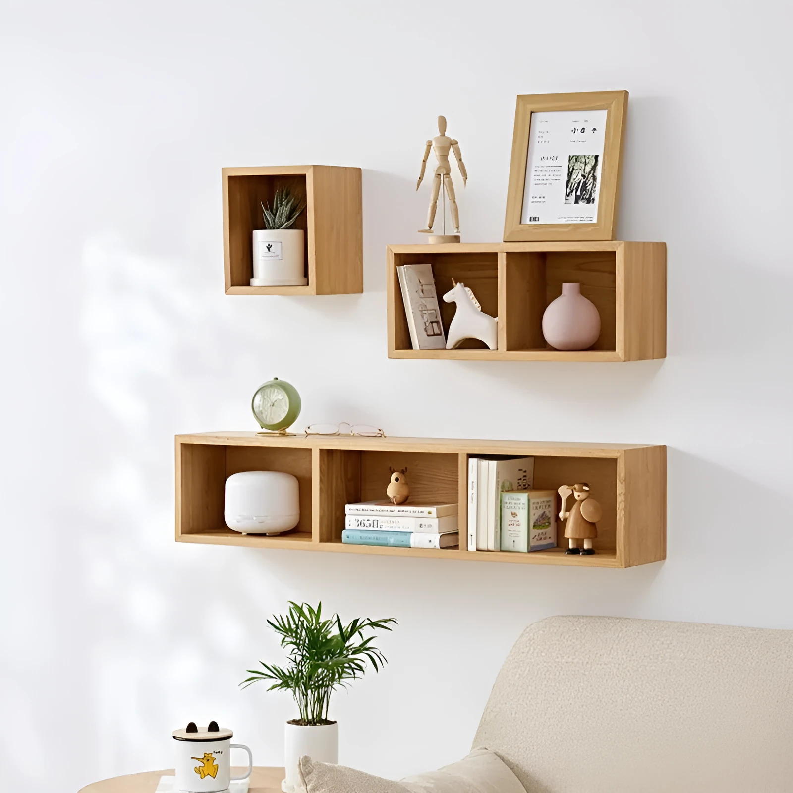 Solid white oak wall-mounted lattice shelf with multiple grids in wood colour, showing books and small decorations