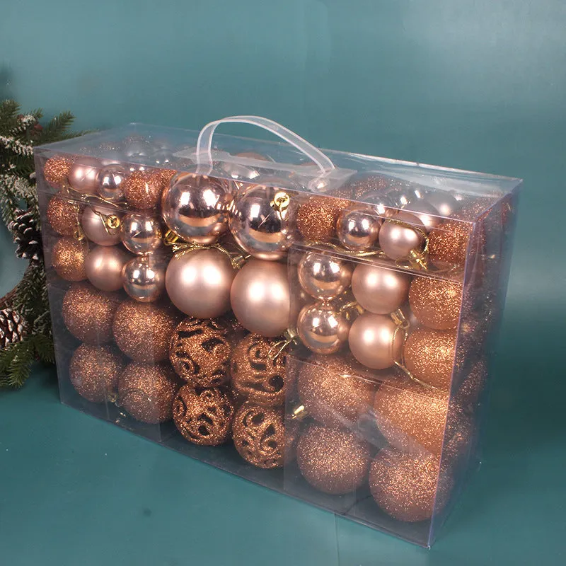 Boxed set of 100 colourful PVC Christmas tree balls in 3-6cm sizes on a neutral background
