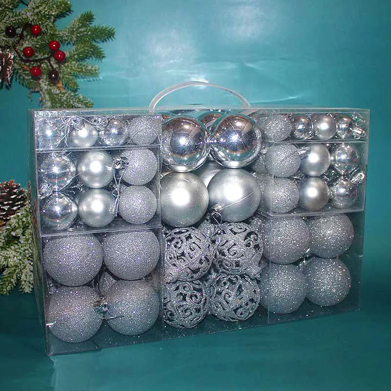 Boxed set of 100 colourful PVC Christmas tree balls in 3-6cm sizes on a neutral background