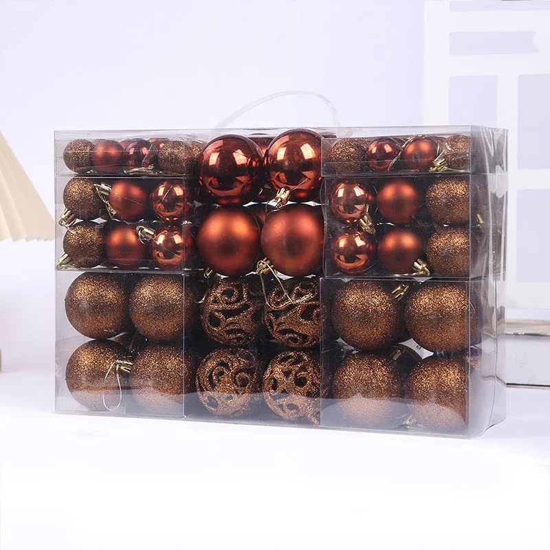 Boxed set of 100 colourful PVC Christmas tree balls in 3-6cm sizes on a neutral background