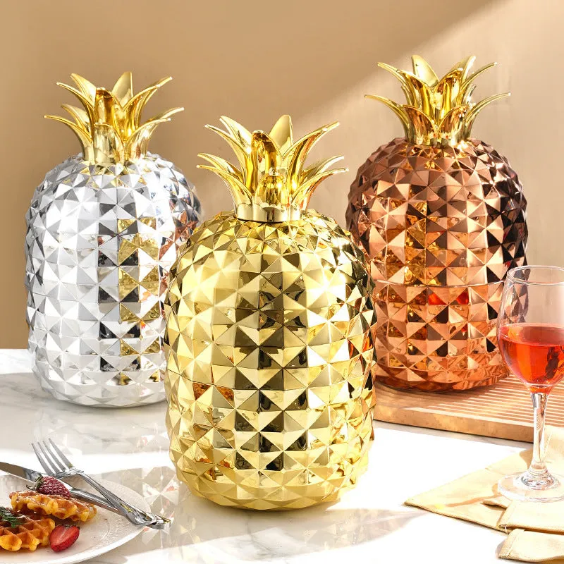 Fashion stainless steel 24-piece tableware set with mirror polish and pineapple egg design in gold finish on a dining table